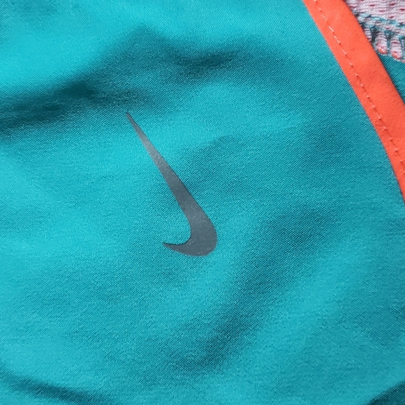 Women's Nike Dri-Fit shorts Dark Mint Green with Orange trim - Picture 3 of 7
